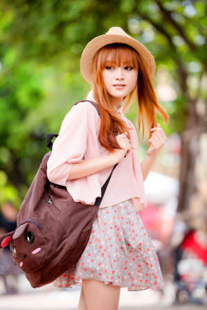 A shot of a beautiful asian woman outdoorの写真素材