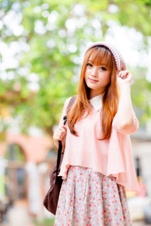 A shot of a beautiful asian woman outdoorの写真素材
