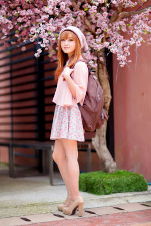 A shot of a beautiful asian woman outdoorの写真素材