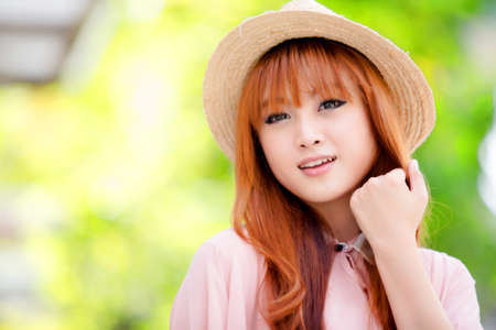 A shot of a beautiful asian woman outdoorの写真素材