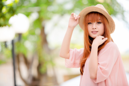 A shot of a beautiful asian woman outdoorの写真素材
