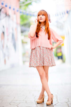 A shot of a beautiful asian woman outdoorの写真素材