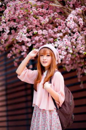 A shot of a beautiful asian woman outdoorの写真素材