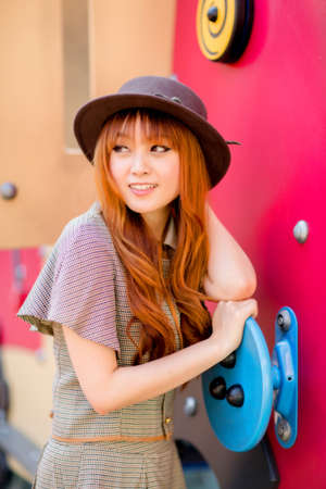 A shot of a beautiful asian woman outdoorの写真素材