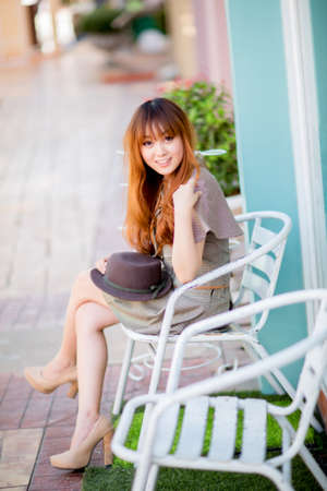 A shot of a beautiful asian woman outdoorの写真素材