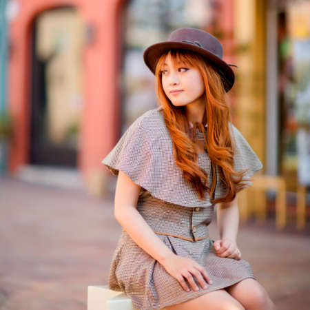 A shot of a beautiful asian woman outdoorの写真素材