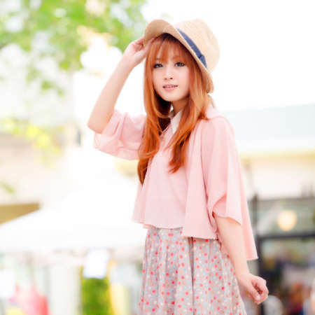 A shot of a beautiful asian woman outdoorの写真素材