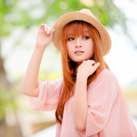 A shot of a beautiful asian woman outdoorの写真素材