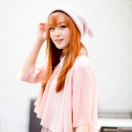 A shot of a beautiful asian woman outdoorの写真素材