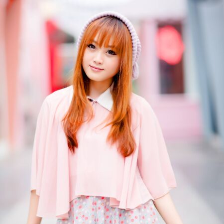 A shot of a beautiful asian woman outdoorの写真素材