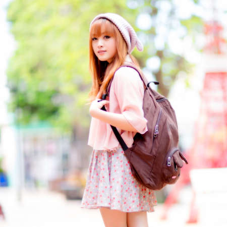 A shot of a beautiful asian woman outdoorの写真素材