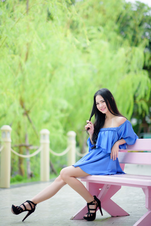Beautiful asian girl in parkの写真素材