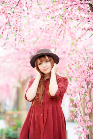 A shot of a beautiful asian woman outdoorの写真素材