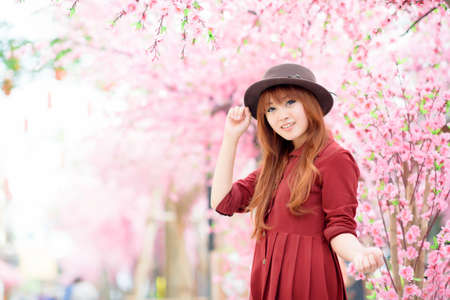 A shot of a beautiful asian woman outdoorの写真素材