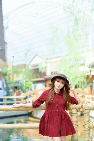 A shot of a beautiful asian woman outdoorの写真素材