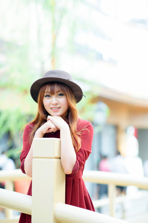A shot of a beautiful asian woman outdoorの写真素材