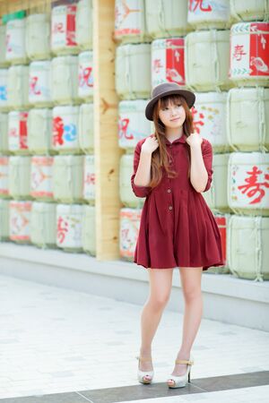 A shot of a beautiful asian woman outdoorの写真素材