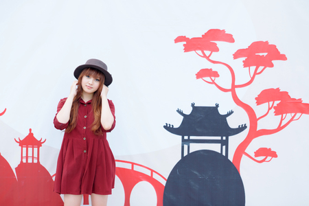 A shot of a beautiful asian woman outdoorの写真素材