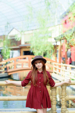 A shot of a beautiful asian woman outdoorの写真素材