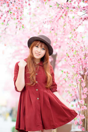 A shot of a beautiful asian woman outdoorの写真素材