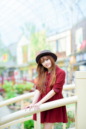 A shot of a beautiful asian woman outdoorの写真素材