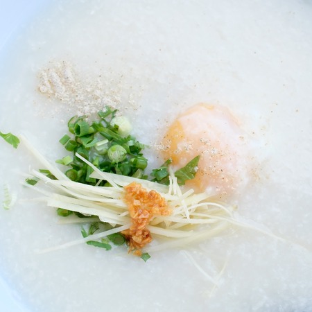 Congee with pork and boiled eggの写真素材