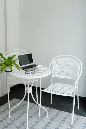 laptop on the table with coffeeの写真素材