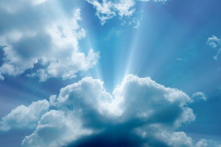 Sunbeam through the haze on blue skyの写真素材