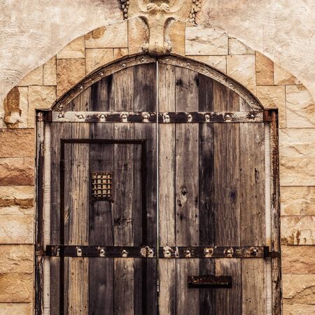 Antique door in the old townの写真素材
