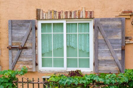 Antique window in the old townの写真素材