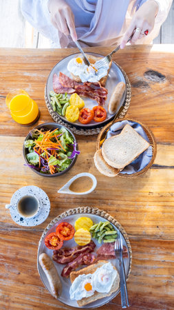 woman having a breakfast in the morningの写真素材