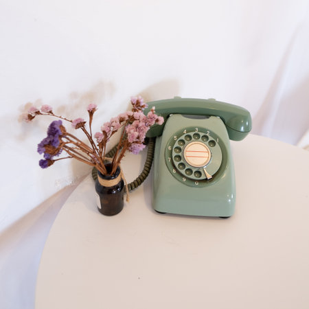 vintage telephone on the tableの写真素材
