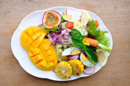 fruit salad on white plate for breakfast in the morning