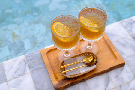 lemon tea juice near the poolの写真素材