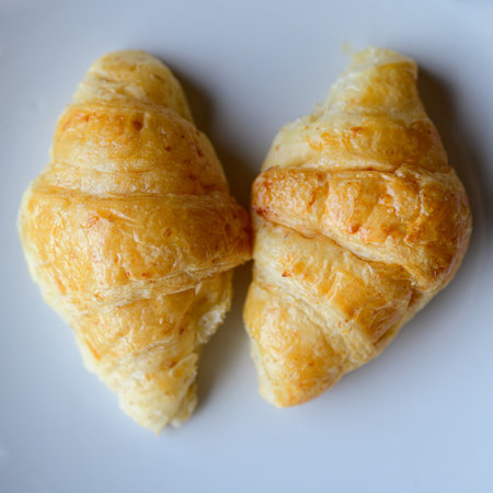 two Croissant on white plateの写真素材