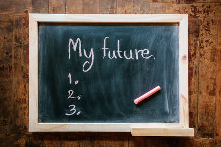 My future is written on a blackboardの写真素材