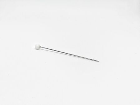 pin for stap on whith backgroundの写真素材