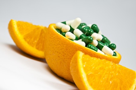 Orange and capsuleの写真素材