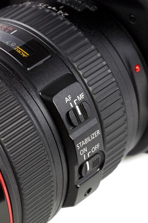 Closeup auto/manual focus button on DSRL camera lenの写真素材