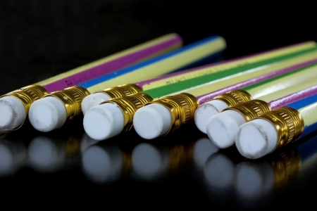 A pencil is a writing implement or art medium usually constructed of a narrow, solid pigment core inside a protective casing の写真素材