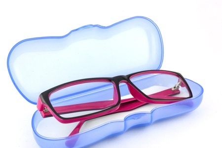 Black-Pink glasses with case, isolated on white background.の写真素材
