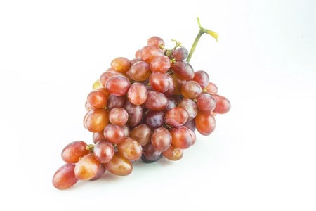Bunch of red grapes Isolated on white background の写真素材