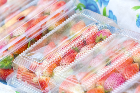 Strawberry is packed in a box and transportation to customers.の写真素材
