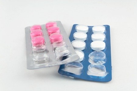 Medical pills isolated on the white の写真素材