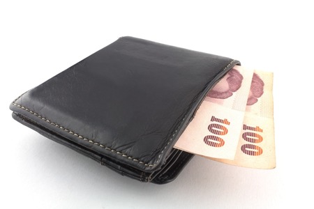 Black wallet with money isolated  on white background の写真素材