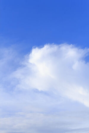 Blue sky with tiny clouds の写真素材
