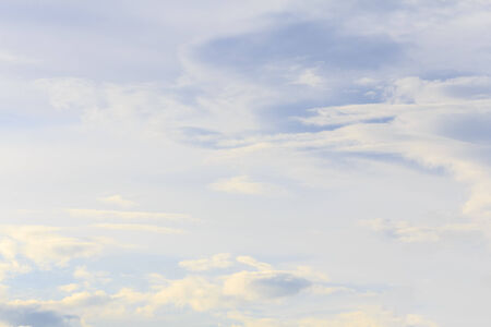 Blue sky with tiny clouds の写真素材