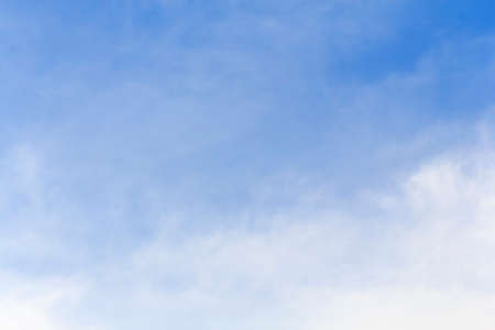 Blue sky with tiny clouds の写真素材