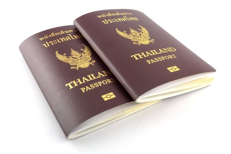Close up Thailand passport on the white background.の写真素材