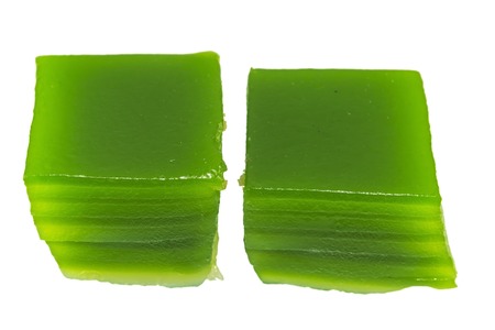 Thai layer cake on white background.
